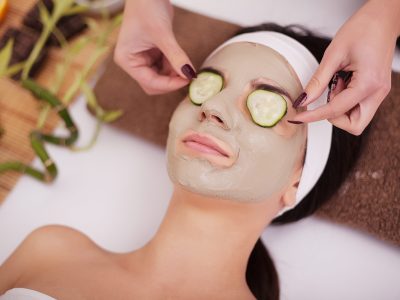 woman-with-clay-facial-mask-in-beauty-spa-in-back-2025-02-14-17-33-21-utc-scaled.jpg